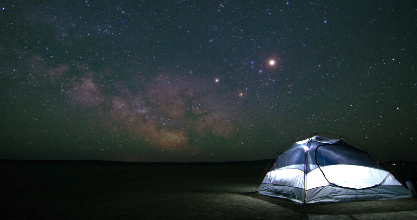 tent under starry sky at Alvord Desert