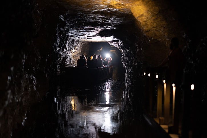 ride a boat to visit cave in New York